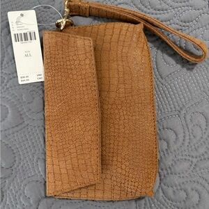 Tan leather wristlet.